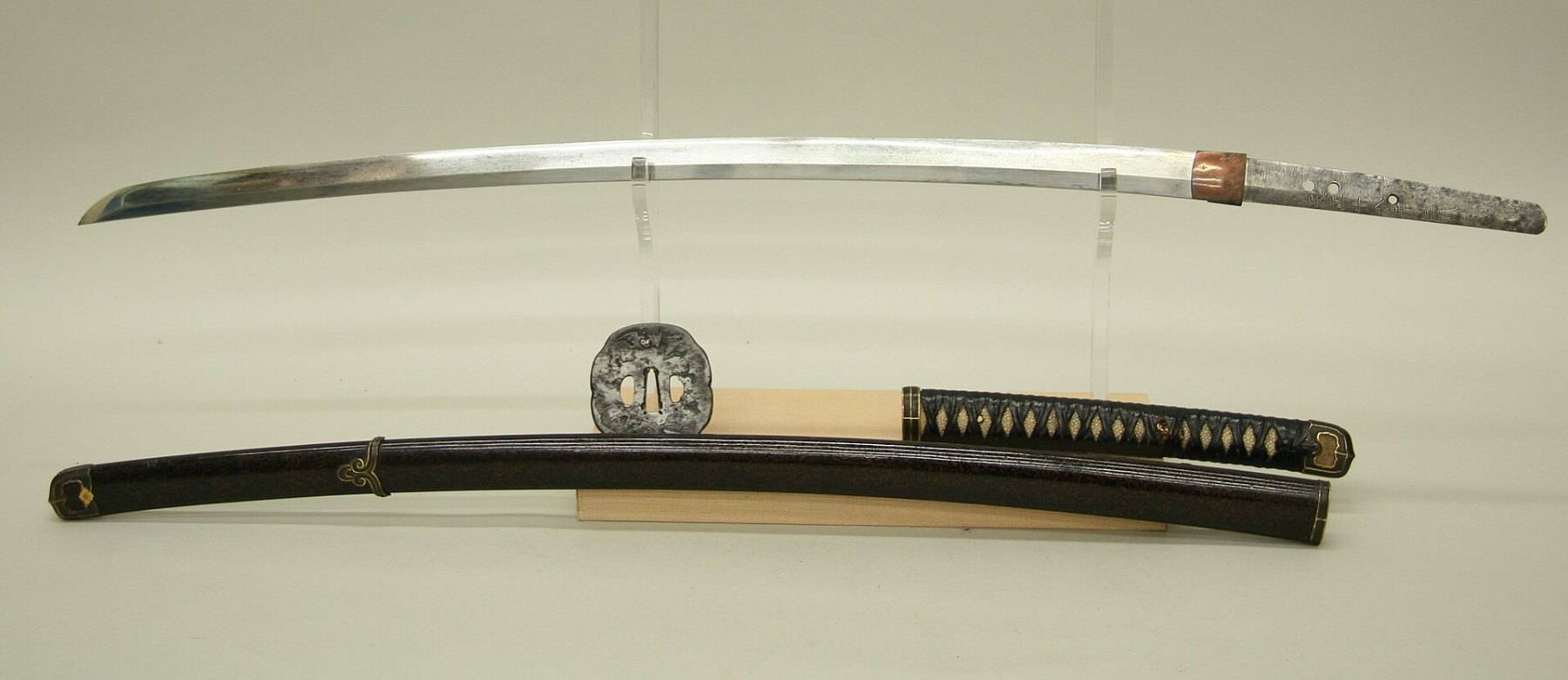 Japanese sword in shirasaya with calligraphy