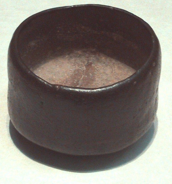 Black Raku tea bowl named Amadera, Momoyama period, Japan.
